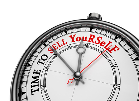 Time to sell yourself motivational concept clock, isolated on white backgroundの写真素材