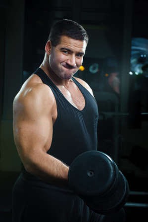 Bodybuilder training in gym
