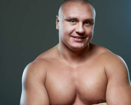 Handsome sexy young guy, studio shotの写真素材