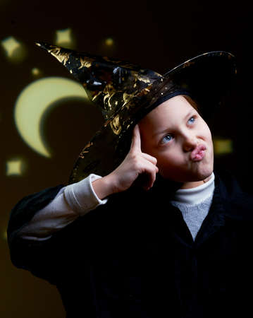 Funny portrait of little witchの写真素材