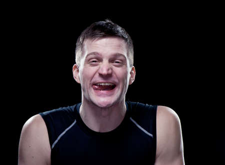 Portrait of a guy with funny facesの写真素材