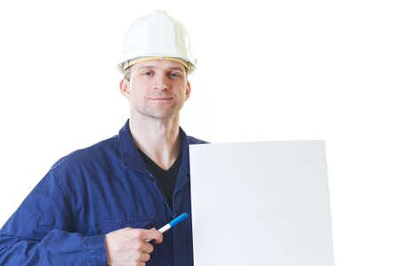 Smiling builder man with blank and pen in hemlet  isolated on white