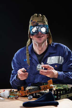 Crazy man in tankmans hat and glasses