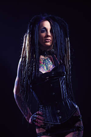 Beautiful demon girl with black eyes, studio shotの写真素材