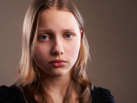Portrait of a depressed teen girlの写真素材