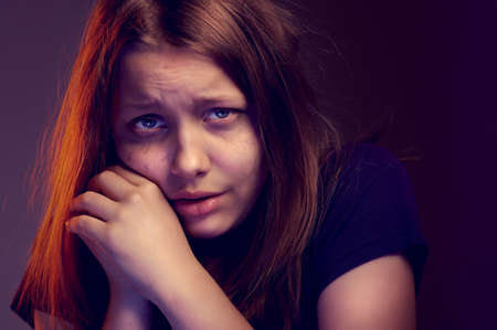 Afraided teen girl experiences fear