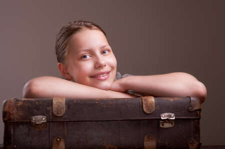 Cute smiling teen girl going on vacation の写真素材