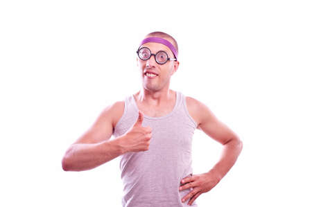 Portrait of a nerd in eyeglasses with thumbs upの写真素材