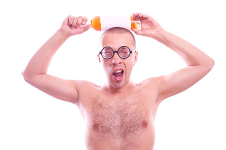 Portrait of a drunk nerd guy in eyeglasses with bottleの写真素材