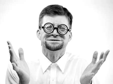 Portrait of an afraid man in glasses