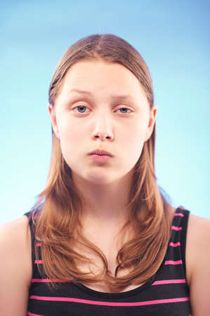 Funny silly teen girl grimacing