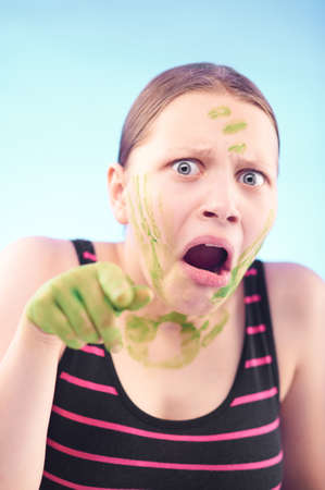 Nervous afraid dirty teen girl の写真素材