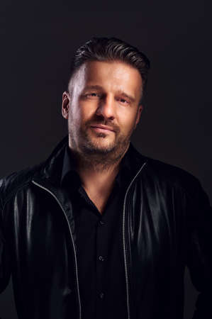 Serious handsome male looking at the cameraの写真素材