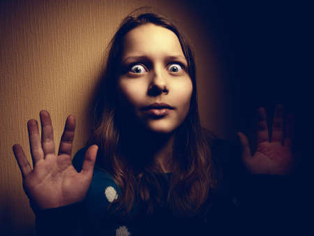 Conceptual image of child abuse. Fear and despair.