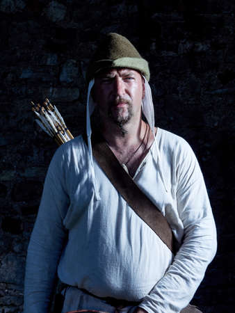 Medieval archer with a bow and arrows.
