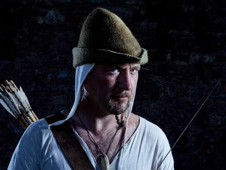 Medieval archer with a bow and arrows.の写真素材