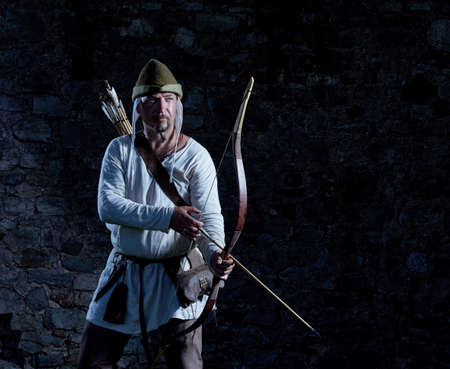 Medieval archer with a bow and arrows.の写真素材