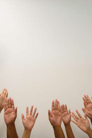 All people raise hands in the airの写真素材