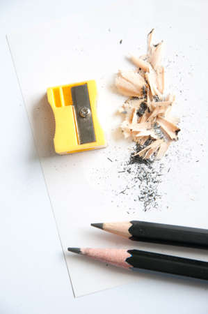 A pencil being sharpened, isolated on white backgroundの写真素材