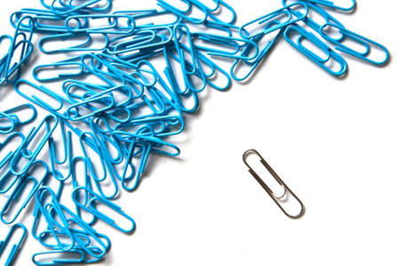 A blue and sliver paper clipの写真素材