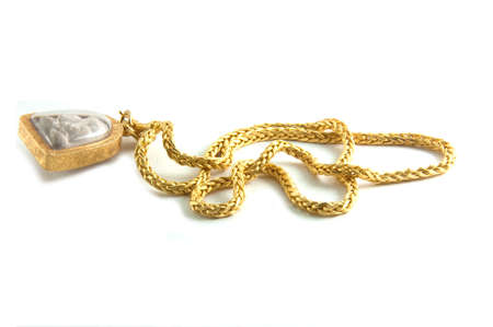 thai holy (Buddha image) thing Yellow gold necklace isolated on whiteの写真素材