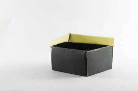 paper mini black and yellow  gift box  on white background