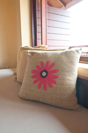 A pile of pillow on sofaの写真素材