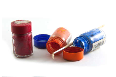 bottle Color paints and brushes on white background