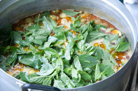 Cook Thai Eggplant curry in potの写真素材