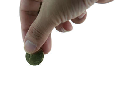 hand dropping a coin into a bank