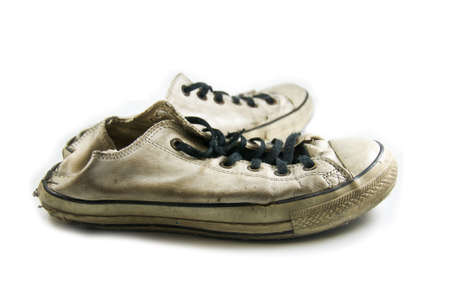 old sneakers on white backgroundの写真素材