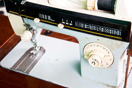 Fragment of the electric sewing machine isolated on white backgroundの写真素材