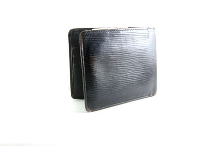 A black wallet or billfold open and emptyの写真素材