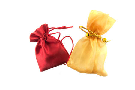 Gold bag and red bag in white background ,use for keep money or cosmeticsの写真素材