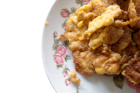 Thai food omelet on white backgroundの写真素材
