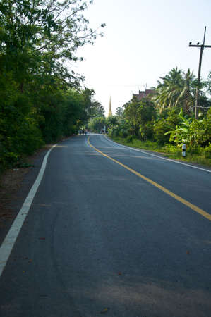Countryside road Beautiful road go to temple,Thailandの写真素材