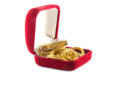 gold in  box on whtie backgroundの写真素材