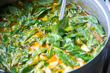 Cook Thai Eggplant curry in potの写真素材