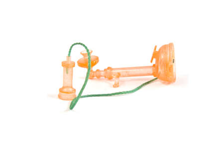 toy orange vintage telephoneの写真素材