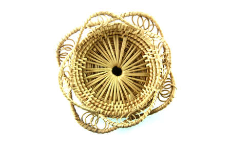 Brown wicker basket top view isolated on white backgroundの写真素材