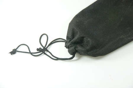 fabric cover black bag white isolated on whiteの写真素材