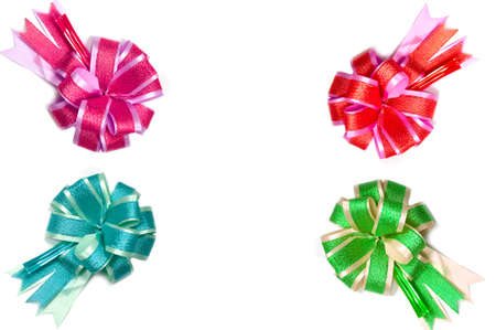 four different colored bow on whiteの写真素材