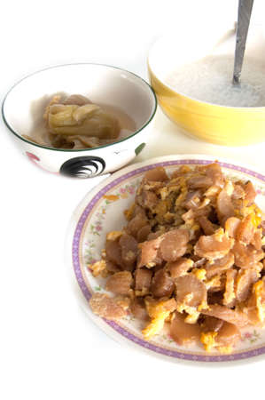 Pickle turnip fry  with egg, soft-boiled rice delicious and famous food in Thailandの写真素材