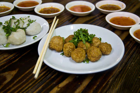 The Closeup of fried shrimp ball on wood tableの写真素材