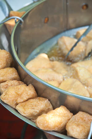 Fried  tofu with sauce is traditional chinese snacks.の写真素材