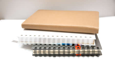 pile notebook on white backgroundの写真素材