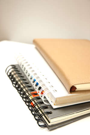 pile notebook on white backgroundの写真素材