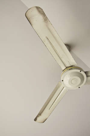The old white ceiling fanの写真素材