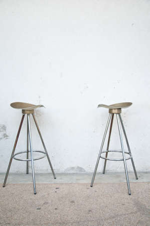 Bar stool in wallの写真素材