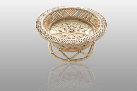 Brown wicker basket  isolated on white backgroundの写真素材